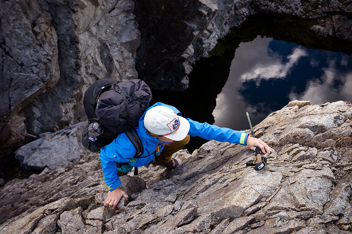 Hyperlite Mountain Gear Unbound 55 backpack (scaling rock wall)